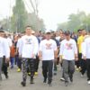 Bupati Lampung Tengah dr. Ardito Wijaya M.K.M Hadiri Jalan Sehat Bersama Masyarakat Dalam Rangka Hari Bhayangkara ke-79